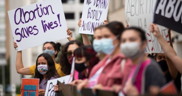 Abortion saves lives sign at protest